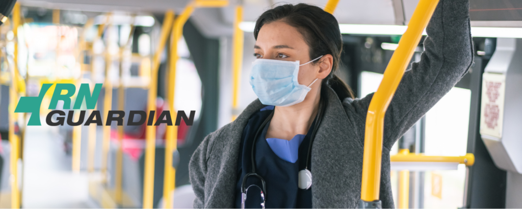 Nurse in a mask on a bus.