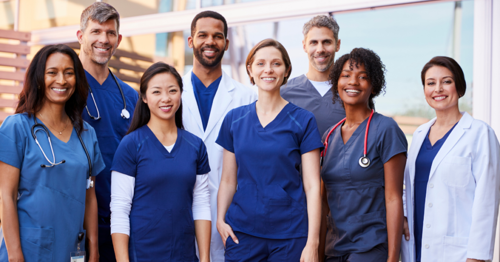 Nurses standing together, smiling