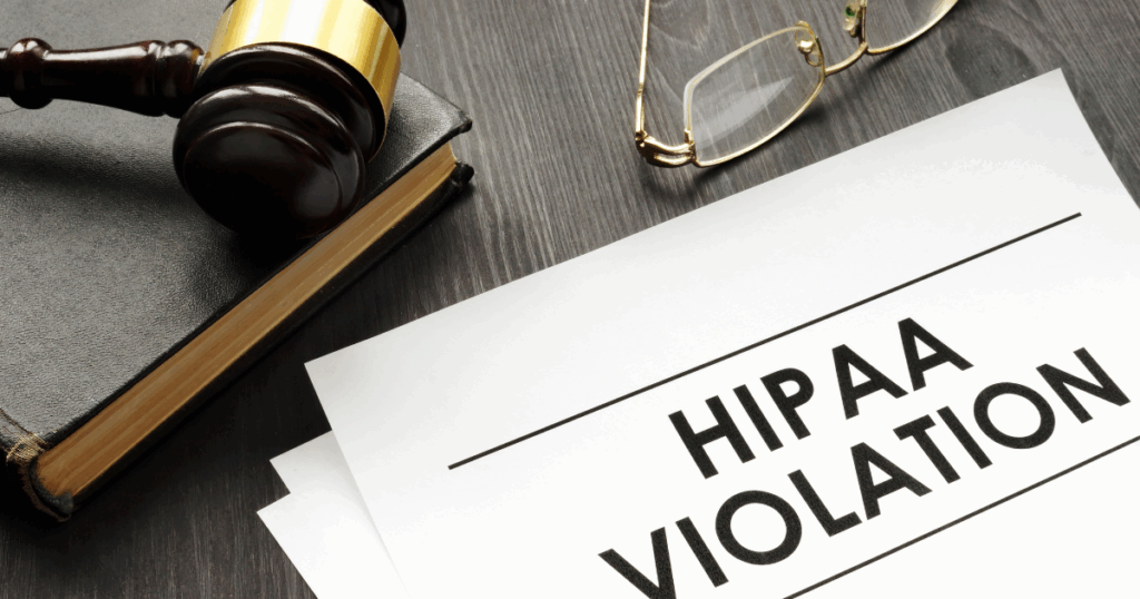 A paper that says “HIPAA Violation” on the front of it.